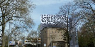 Ein ehemaliger Luftschutzbunker, der zum BASF-Standort Ludwigshafen gehört, wird um einen Gebäudeteil erweitert. Die vorgehängte Fassade besteht aus organischen Formen aus Metall, sie spielt mit Licht und Schattenwirkungen. BASF-Designer werden in dem neuen Gebäudeteil gemeinsam mit Kunden neue Produkte entwickeln. (Foto: BASF SE)