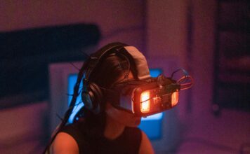 A Woman in a Tank Top Using a VR Headset (cottonbro studio / Pexels)